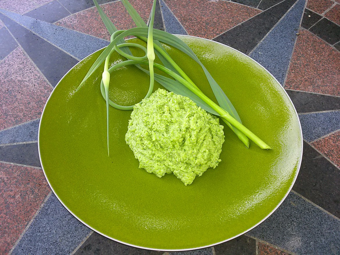 Unlike pesto made with basil, garlic scape pesto keeps its vibrant green color.