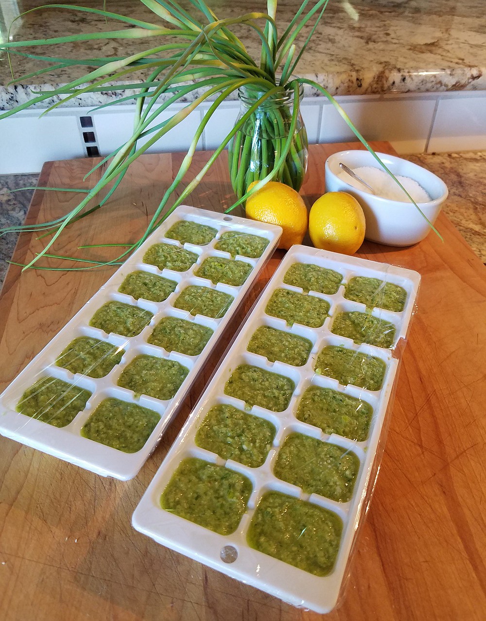 Freeze an extra batch of garlic scape pesto for future use. Ice cube trays or mini muffin tins are the perfect size for perfect portions.