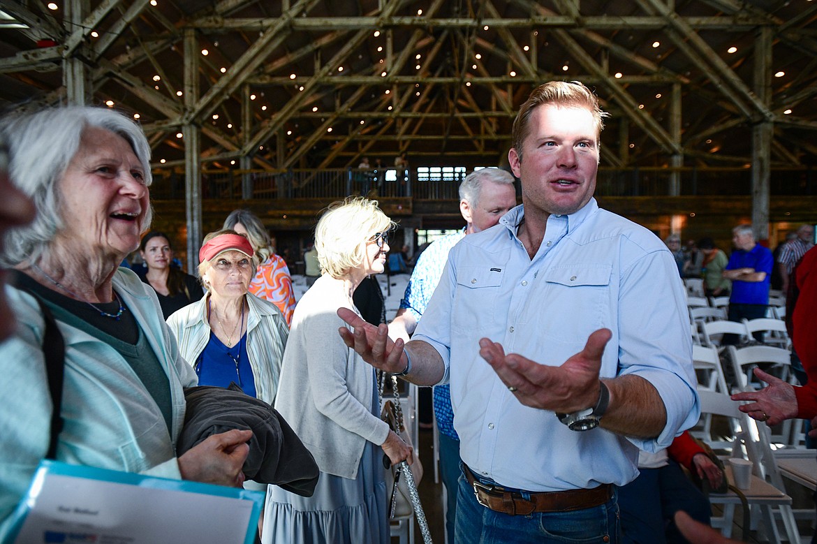 Republican U.S. Senate candidate Tim Sheehy speaks with attendees after a Save America Rally with former congresswoman and 2020 presidential candidate Tulsi Gabbard at Snowline Acres in Kalispell on Thursday, June 13. (Casey Kreider/Daily Inter Lake)