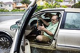 Stalled cars in flooded streets leave South Florida looking like a scene from a zombie movie