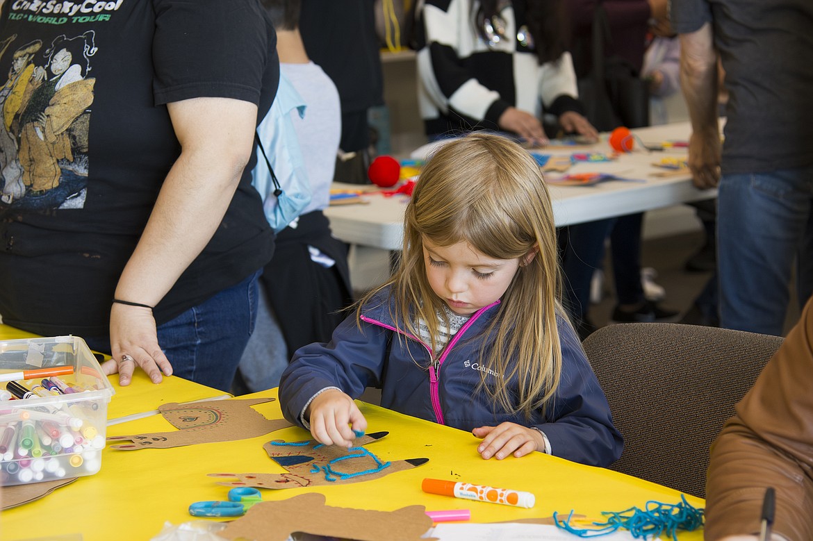 A child participates in arts and crafts as part of the Día de los Niños y los Libros – Day of the Children and Day of the Books – celebration at Othello Public Library in April. Arts and crafts and other activities will be part of Mid-Columbia Library’s summer reading program, which started at the beginning of June.