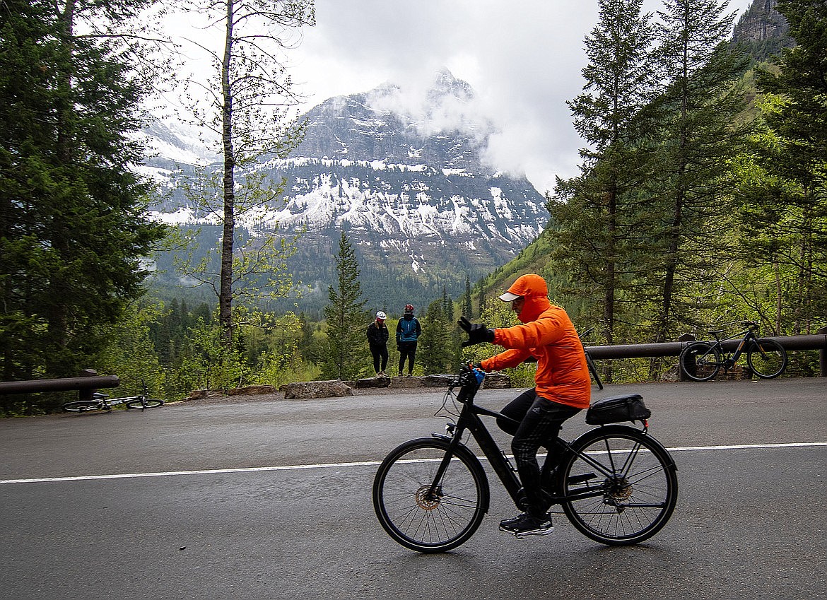 A biker makes their way on the Going-to-the-Sun Road in Glacier National Park.