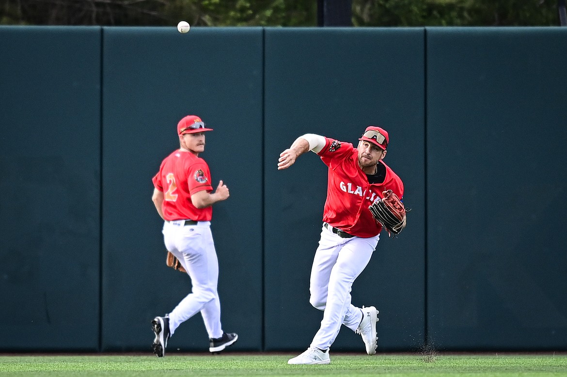 Glacier centerfielder Ajay Sczepkowski (24) throws to third base against the Idaho Falls Chukars at Glacier Bank Park on Friday, June 14. (Casey Kreider/Daily Inter Lake)