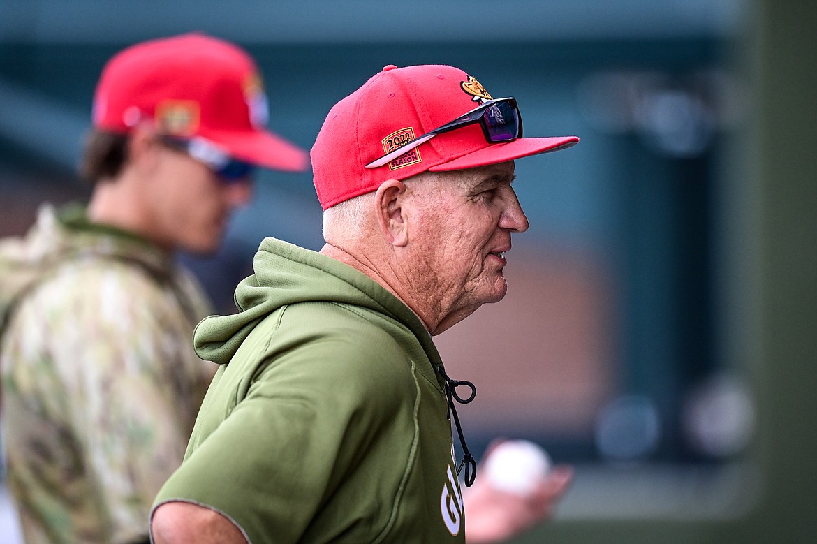 Glacier bench coach Stu Pederson talks inside the dugout before the game against the Idaho Falls Chukars at Glacier Bank Park on Friday, June 14. (Casey Kreider/Daily Inter Lake)