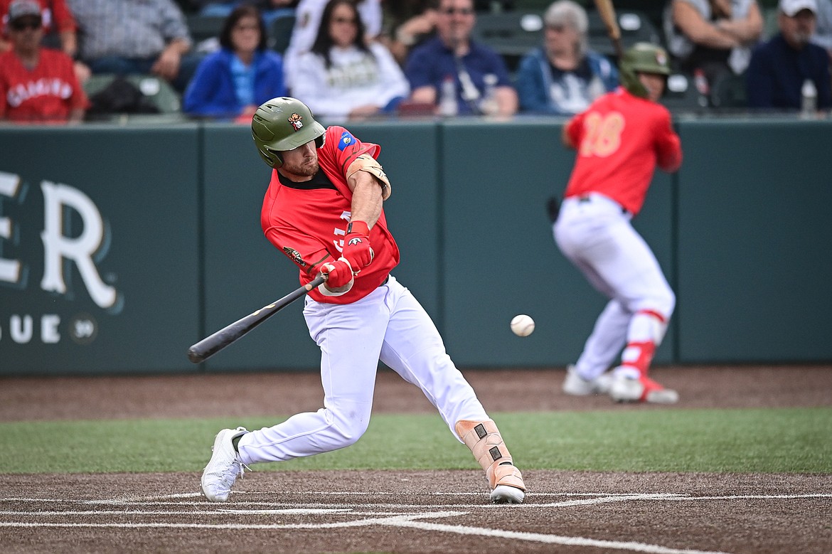 Glacier's Ajay Sczepkowski (24) singles in a run in the second inning against the Idaho Falls Chukars at Glacier Bank Park on Friday, June 14. (Casey Kreider/Daily Inter Lake)