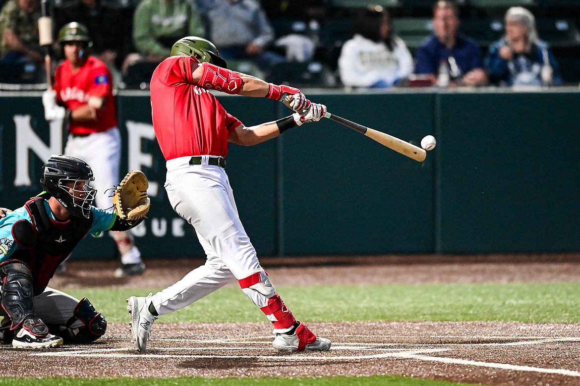 Glacier's Chad Castillo (28) connects on a double against the Idaho Falls Chukars at Glacier Bank Park on Friday, June 14. (Casey Kreider/Daily Inter Lake)