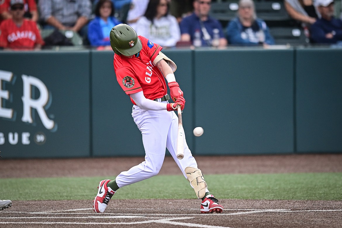 Glacier's Jerry Huntzinger (30) brings home a run with a single in the third inning against the Idaho Falls Chukars at Glacier Bank Park on Friday, June 14. (Casey Kreider/Daily Inter Lake)