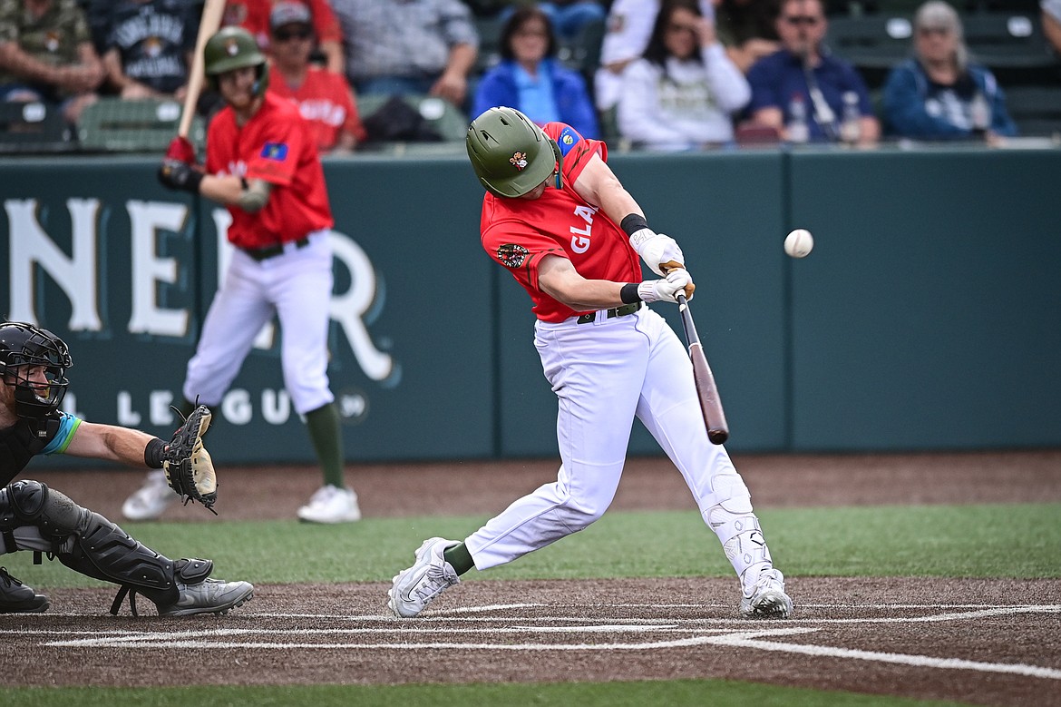 Glacier's Gavin Tonkel (5) connects on a two-run home run to right field in the third inning against the Idaho Falls Chukars at Glacier Bank Park on Friday, June 14. (Casey Kreider/Daily Inter Lake)