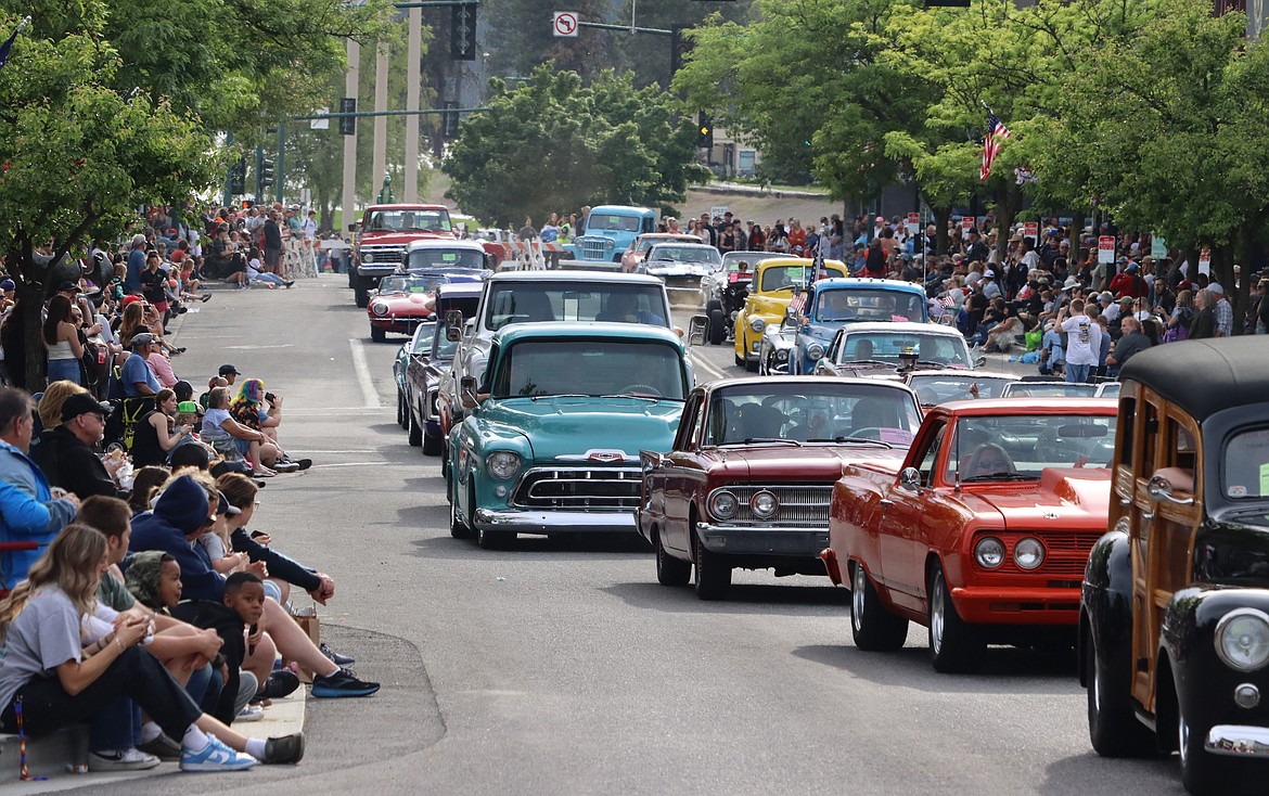 Classic cars cruise up Sherman Avenue in Car d'Lane on Friday.