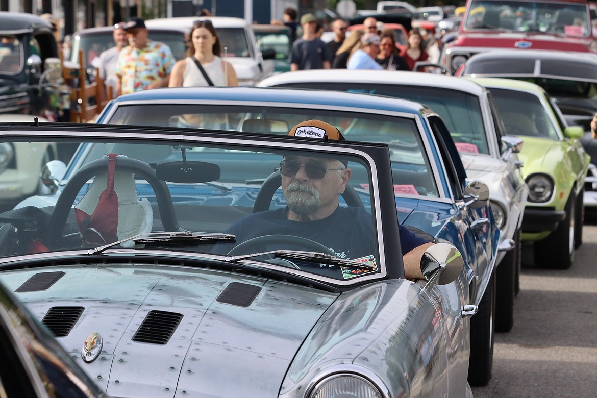 Dave Priano of Coeur d’Alene sits in his 1954 Nash Metropolitan waiting for the start of Car d'Lane.