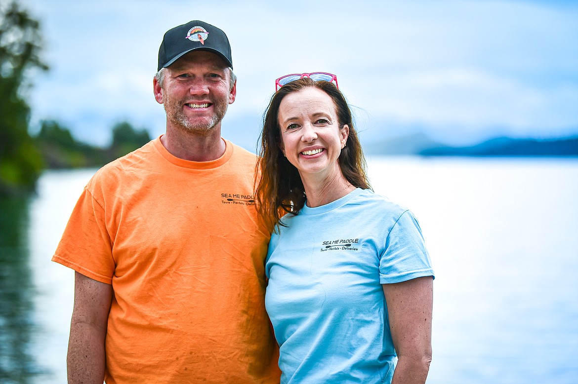 Justin and Kelsey Flake, new owners of Sea Me Paddle in Lakeside, pictured at the Somers Boat Launch on Friday, June 14. (Casey Kreider/Daily Inter Lake)