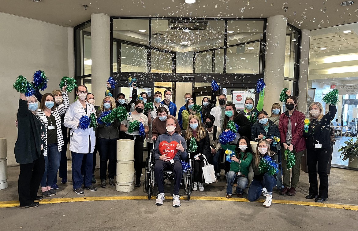 Courtesy photo
Dan Christ, surrounded by family, friends and medical personnel, prepares to leave Providence Sacred Heart Medical Center in Spokane in March 2023, after receiving a heart transplant.