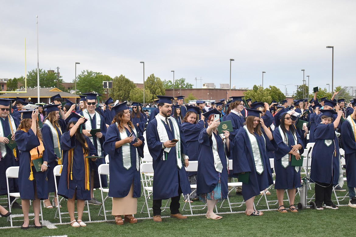 New Big Bend Community College graduates turn their tassels at the close of the graduation ceremony Friday.