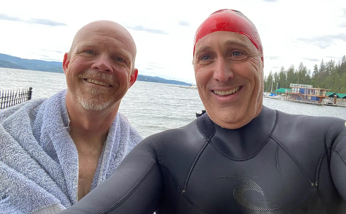 Kip Taylor, left, and Dr. Geoff Emry after a recent chilly swim at Sanders Beach.