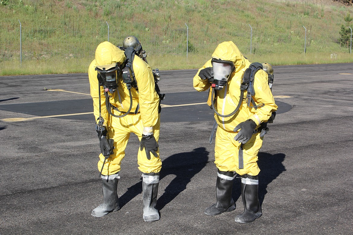 As hot as it was Thursday evening, participants never buckled. Hazmat suits became saunas. (Monte Turner/Mineral Independent)