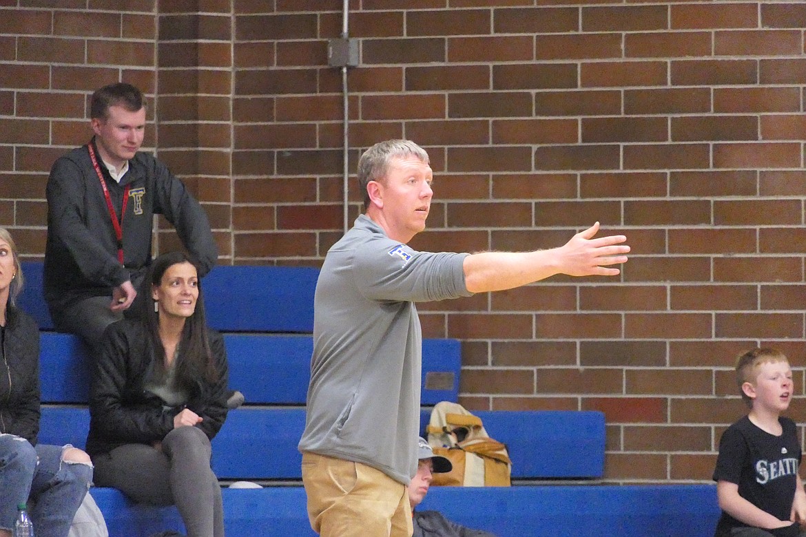 Thompson Falls head basketball coach Jake Mickelson directs traffic with players on the court during summer basketball play in T Falls. (Chuck Bandel/VP-MI)