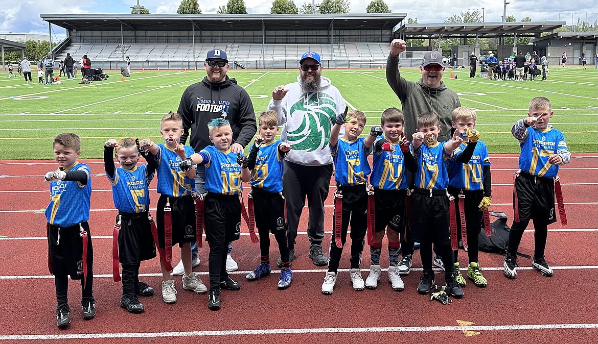 Courtesy photo
The Rathdrum Rush first/second grade boys team won the Gridiron Flag Football League championship recently in Seattle. The Rush finished 11-0. The Rush went 7-0 in the regular season, then won twice in the playoffs on June 9 at Ridgeline High in Liberty Lake to advance to Seattle. There, the Rush won its first game 32-0 to advance to the championship game, where the Rush won 42-12. In the front row from left are Porter Horsley, Bradley Gustin, Trey Hutchison, Cameron Howard, Camden Galvin, Nash Lyden, Curran Oswald, Jaxon Dunn, Graham Brown and Mason Scholten; and back row from left, coaches Matt Howard, Dusty Hutchison and Tom Dunn.