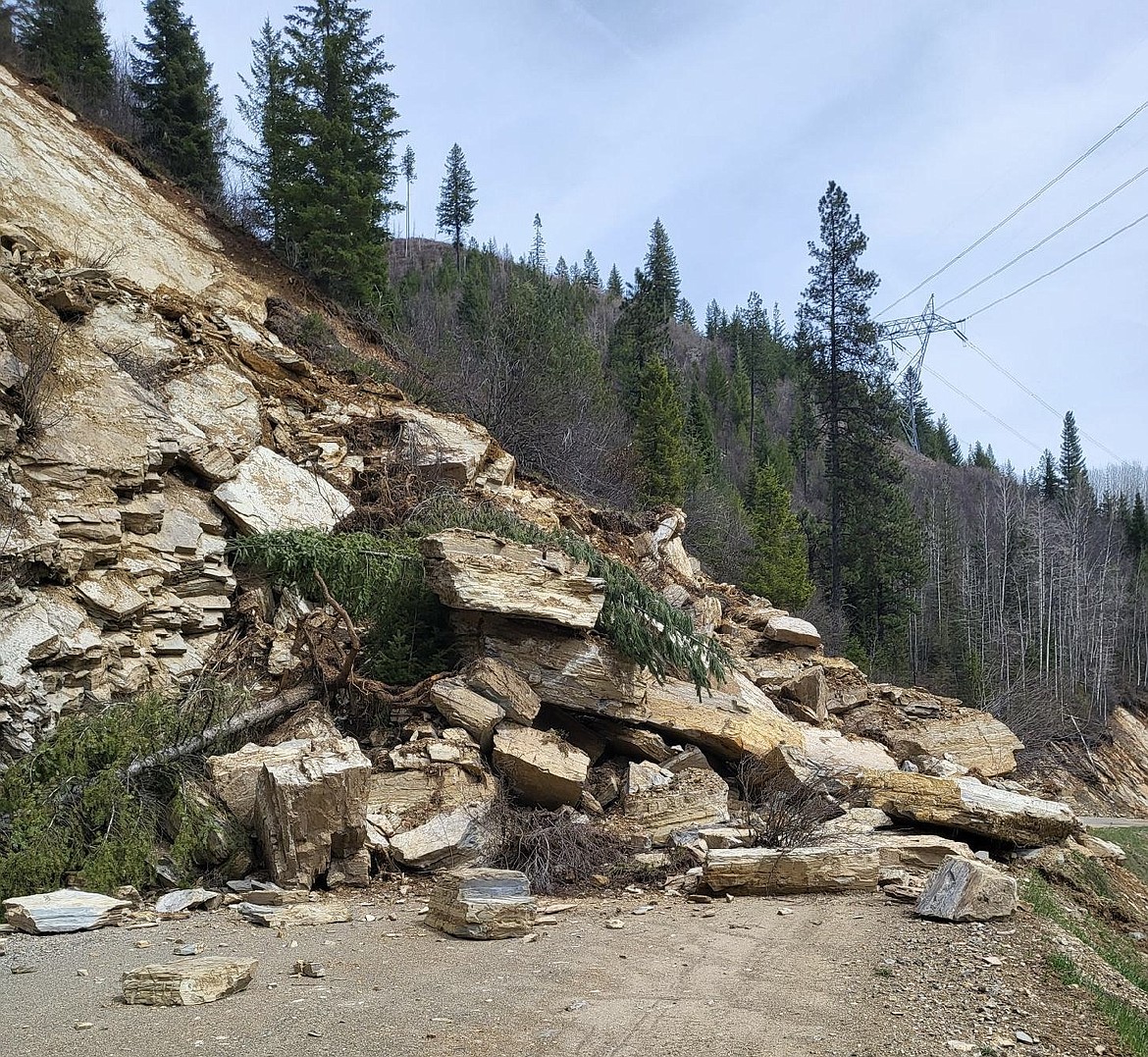 A massive rockslide on Moon Pass blocked the road completely in April. The debris from the slide has been cleared, but must now be crushed before it can be used to repair the road.