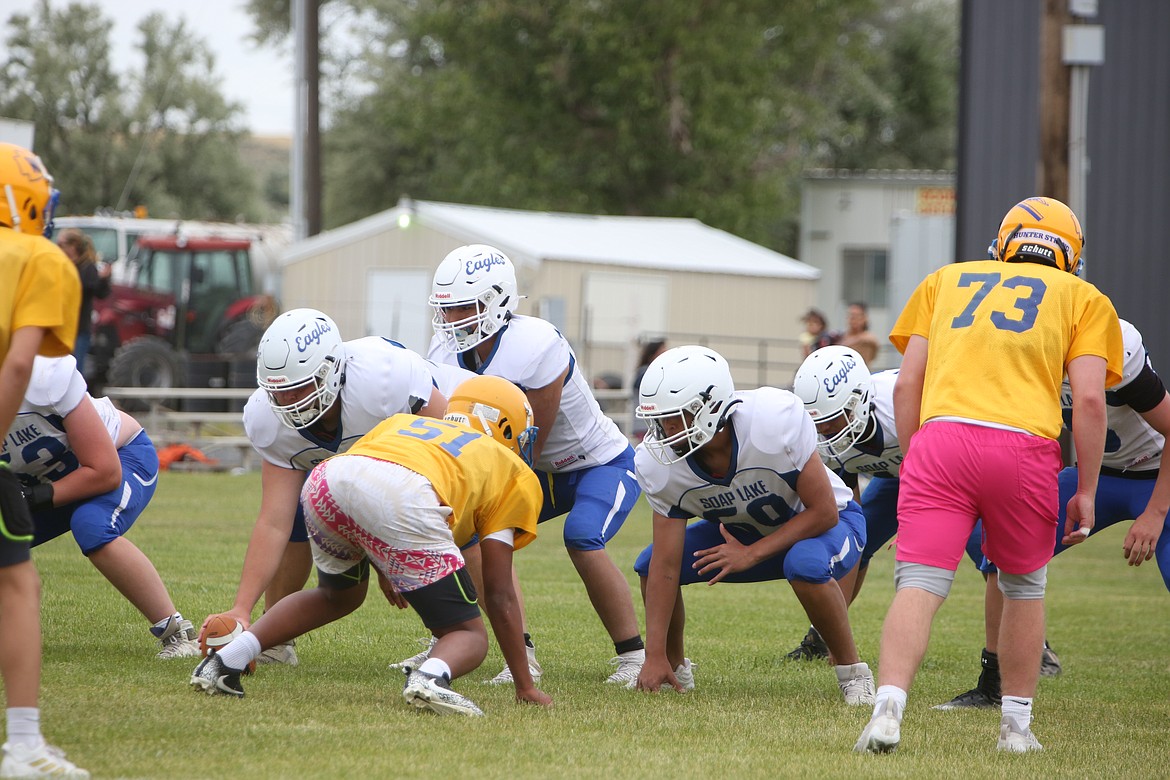 The Soap Lake offense lines up against Wellpinit during a scrimmage on Friday in Coulee City.