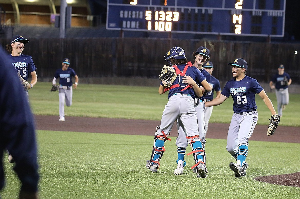 Members of the Columbia Basin River Dogs celebrate after a game during the 2023 season. Columbia Basin is coming off an appearance at a tournament in Medical Lake last weekend and now prepares to travel to the Palouse Summer Series beginning Thursday.