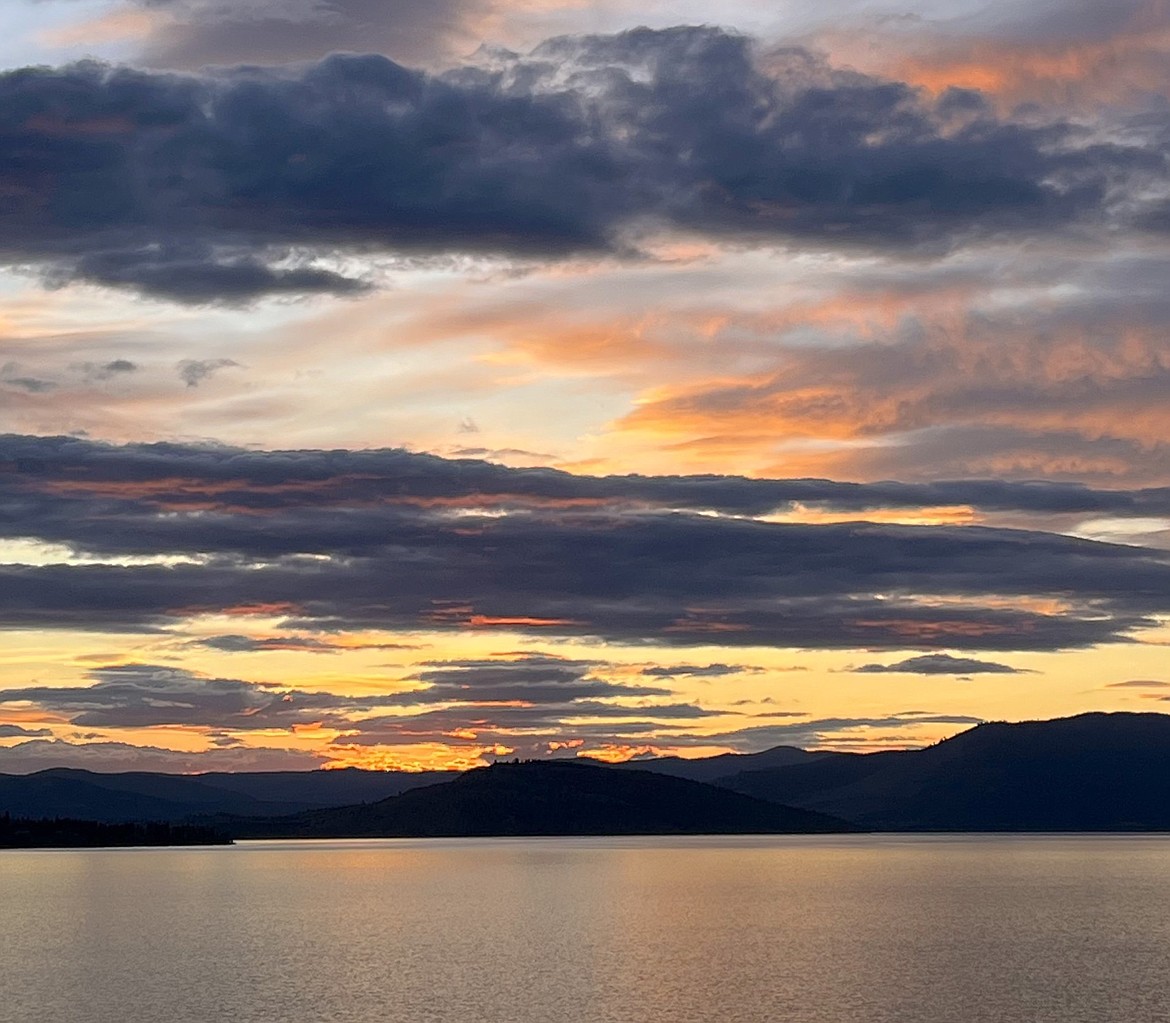 Sunset over Flathead Lake, which measured 2893.11 feet on Tuesday, a little above the full-pool mark of 2,893. (Kristi Niemeyer/Leader)
