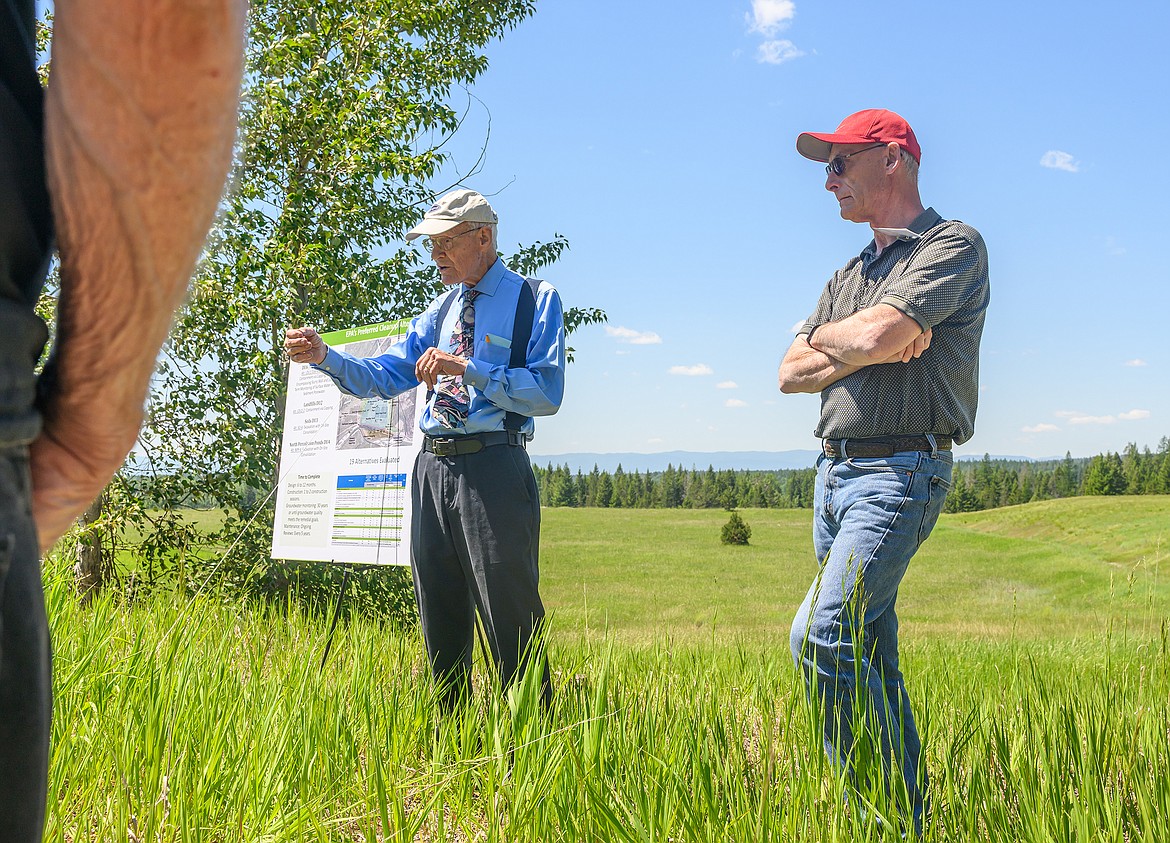 Dick Sloan, left, of the Montana DEQ talks about the CFAC cleanup plan while CFAC project manager John Stroiazzo looks on last week. (Chris Peterson/Hungry Horse News)