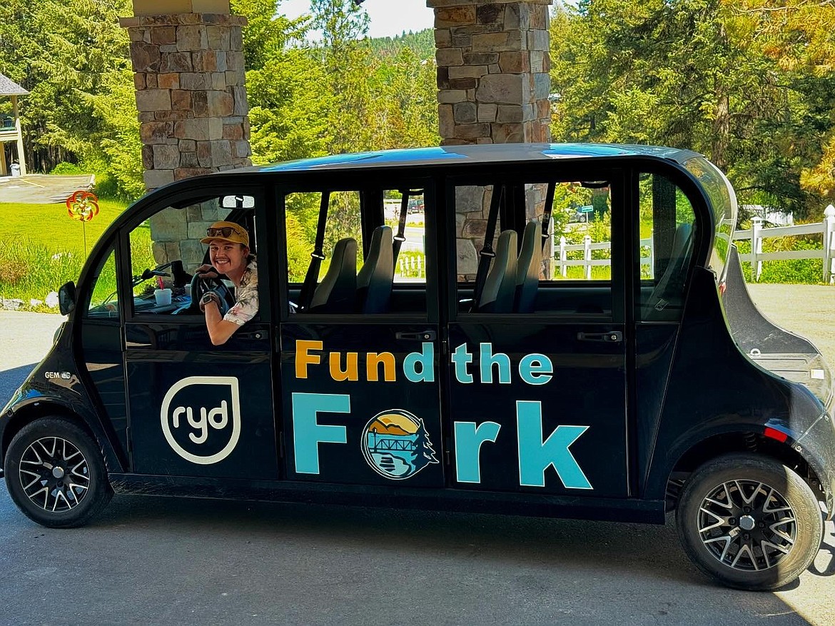 Fund the Fork’s electric shuttle is seen in this photo. The shuttle service, which is free for users, came about following the closure of the Bridge Street Bridge earlier this year. (Photo courtesy of Timbers Motel)