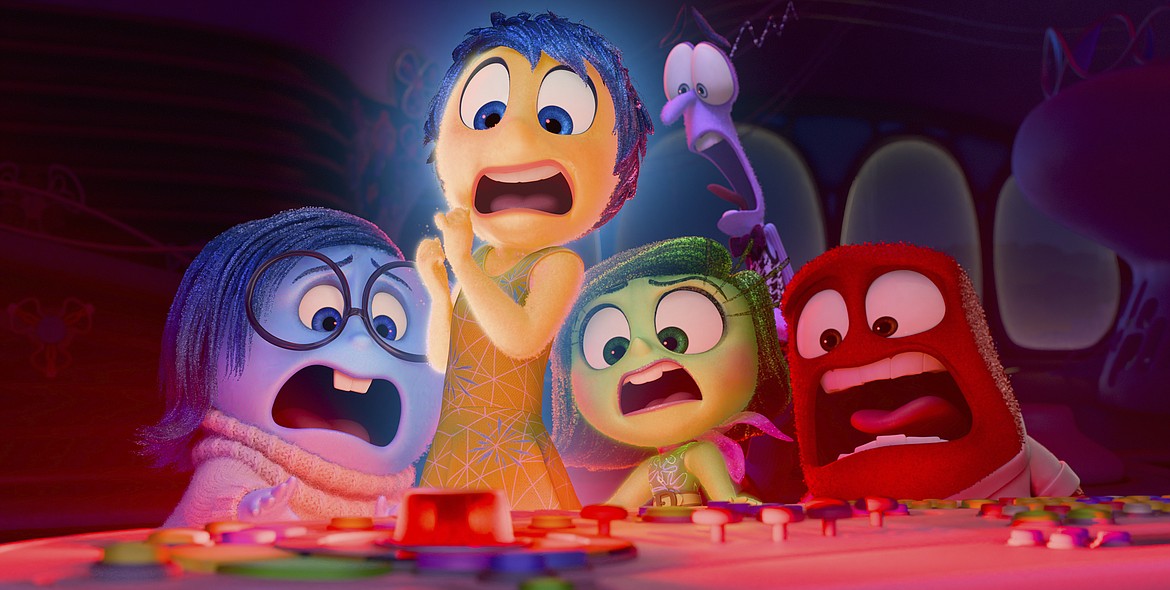This image released by Disney/Pixar shows, from left, Sadness, voiced by Phyllis Smith, Joy, voiced by Amy Poehler, Disgust, voiced by Liza Lapira, Fear, voiced by Tony Hale and Anger, voiced by Lewis Black, in a scene from "Inside Out 2."