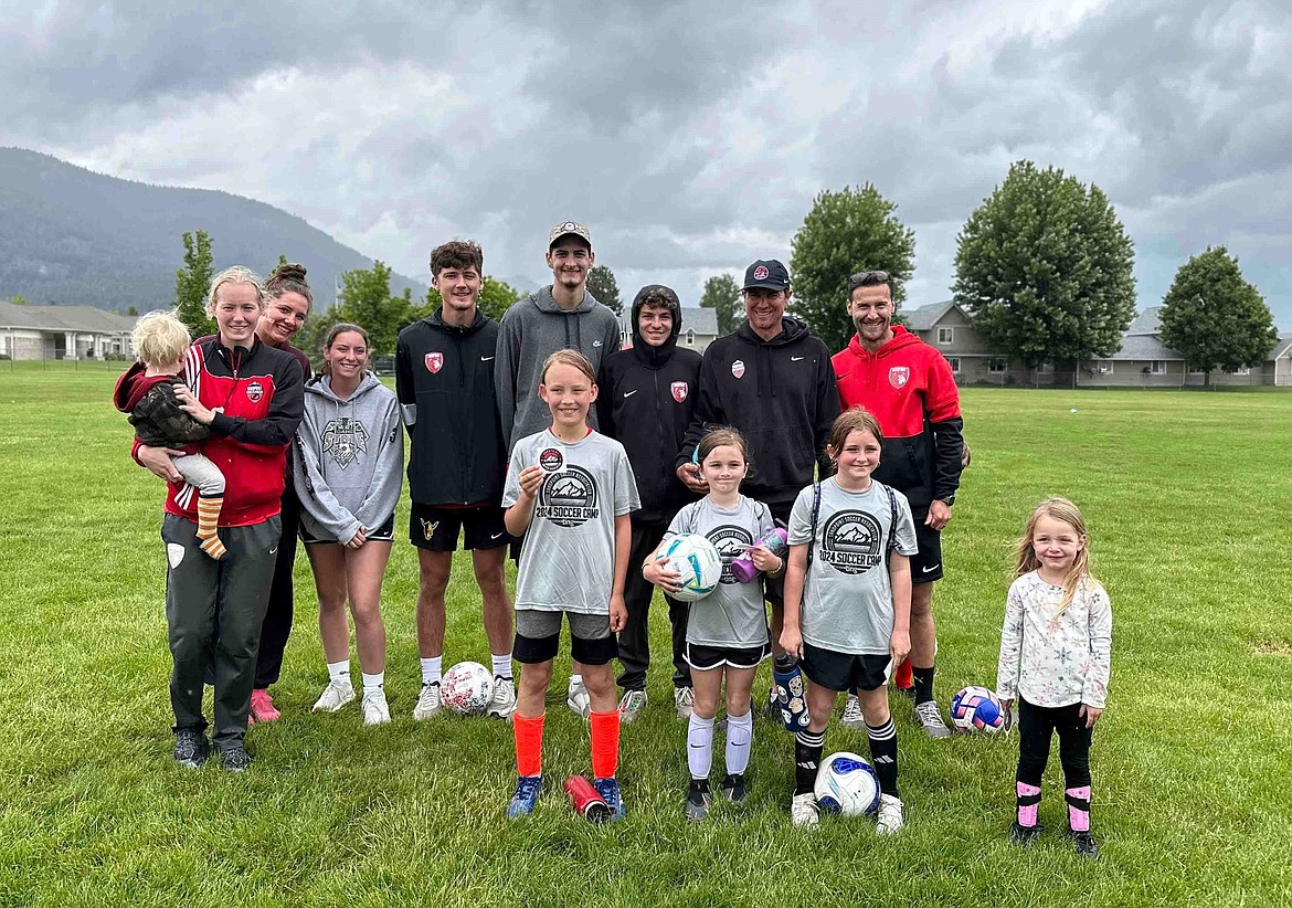 The Sandpoint Soccer Association Rec Camp's Day 2 Campers of the Day. Front row, from left are campers Liam Moritz, Rya Verlanic, Zoe Verlanic and Ellory Baranski. Back row, from left are coaches Hattie Dussault, Kylie Burnett, Lilly Carlson, Evan Dickinson, Kael McGowan, Tyler Bangle, Brad Williams and Conor Baranski.