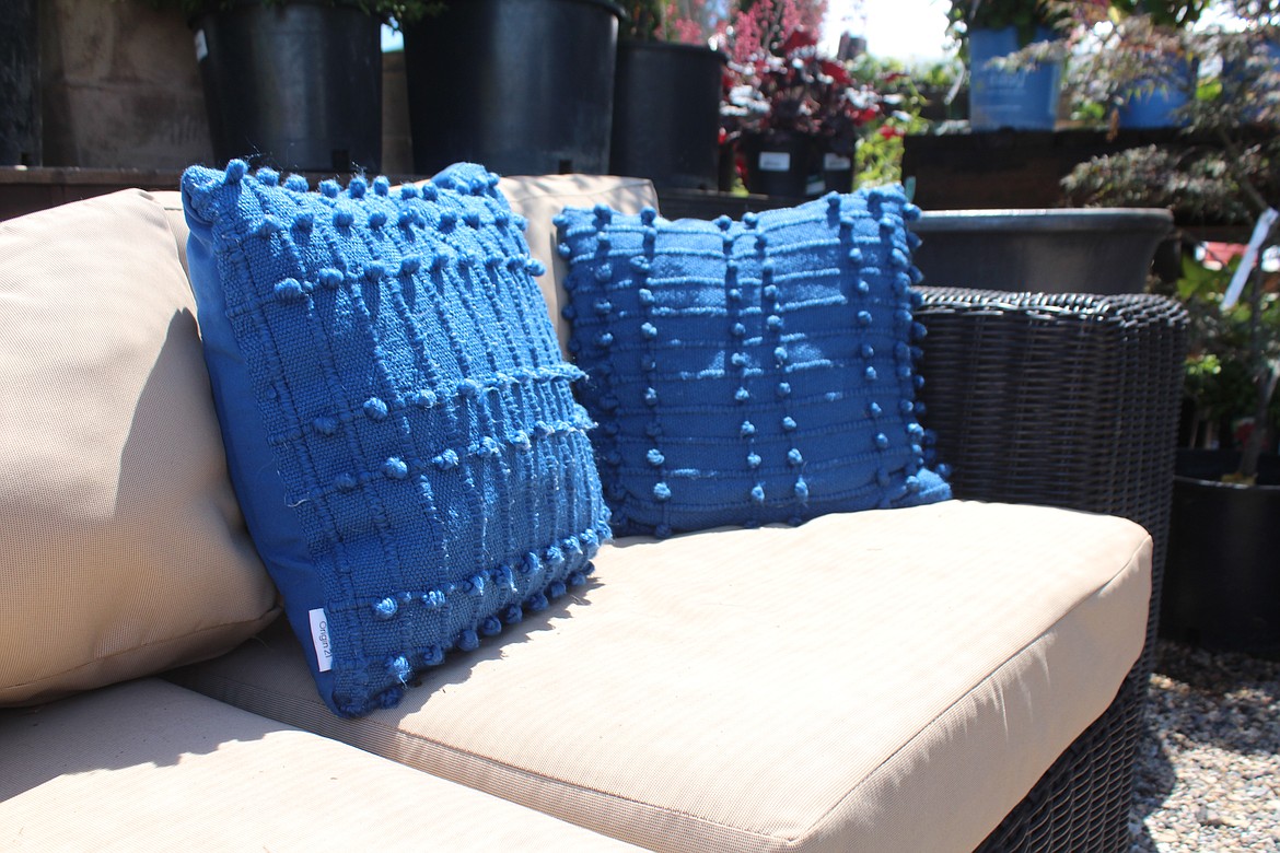 Comfortable seating with cushions that can be stored is important on a patio, said decorator Sherri Van Diest.