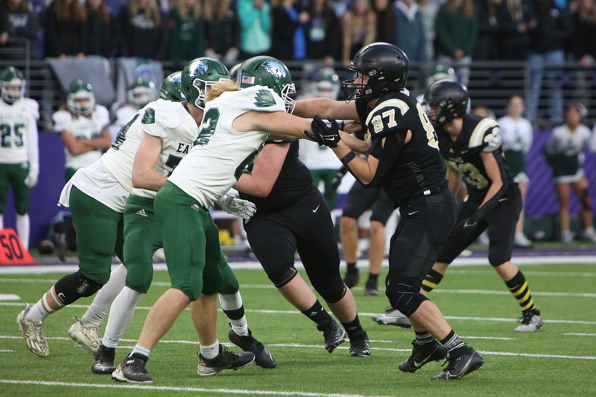 Royal graduate Bennet Brown (87) looks to get past a Lakeside (Nine Mile Falls) offensive lineman during the state championship game in Seattle in December. Brown will be playing for the East team at Saturday’s Earl Barden Classic.