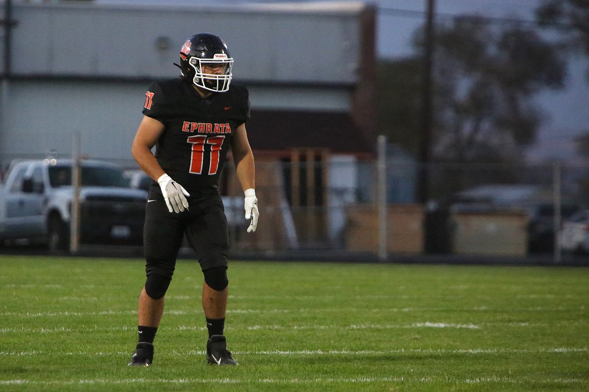 Ephrata graduate Eric O’Neel lines up before a play during a game against East Valley (Yakima) last season.