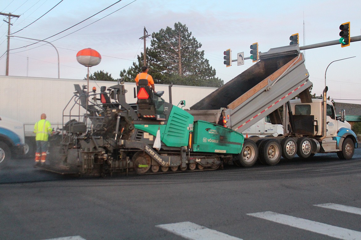 Construction crews pave a section of State Route 17 last week. Crews will be working 24/7 over this weekend repaving the SR 17 bridge over Parker Horn.