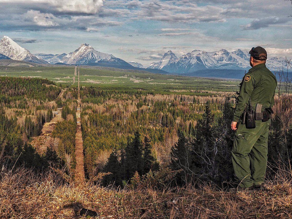 A Border Patrol agent standing watch at the Montana-Canada border in the CBP Spokane Sector. The Spokane Sector covers the U.S.-Canada border along the northwestern section of Montana, part of Idaho, and the eastern part of Washington.