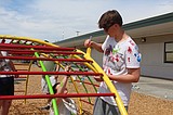 Volunteer project brightens Larson Heights playground