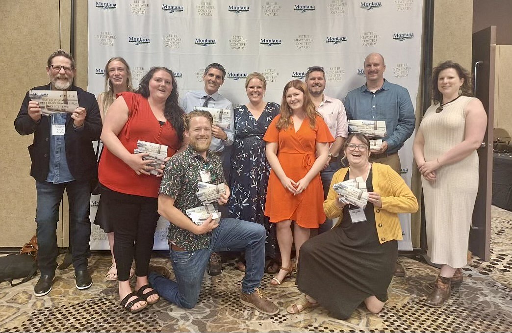 Daily Inter Lake staff members display their awards at the Montana Newspaper Association's annual convention and awards banquet Saturday, June 22 at the Red Lion Hotel in Kalispell.