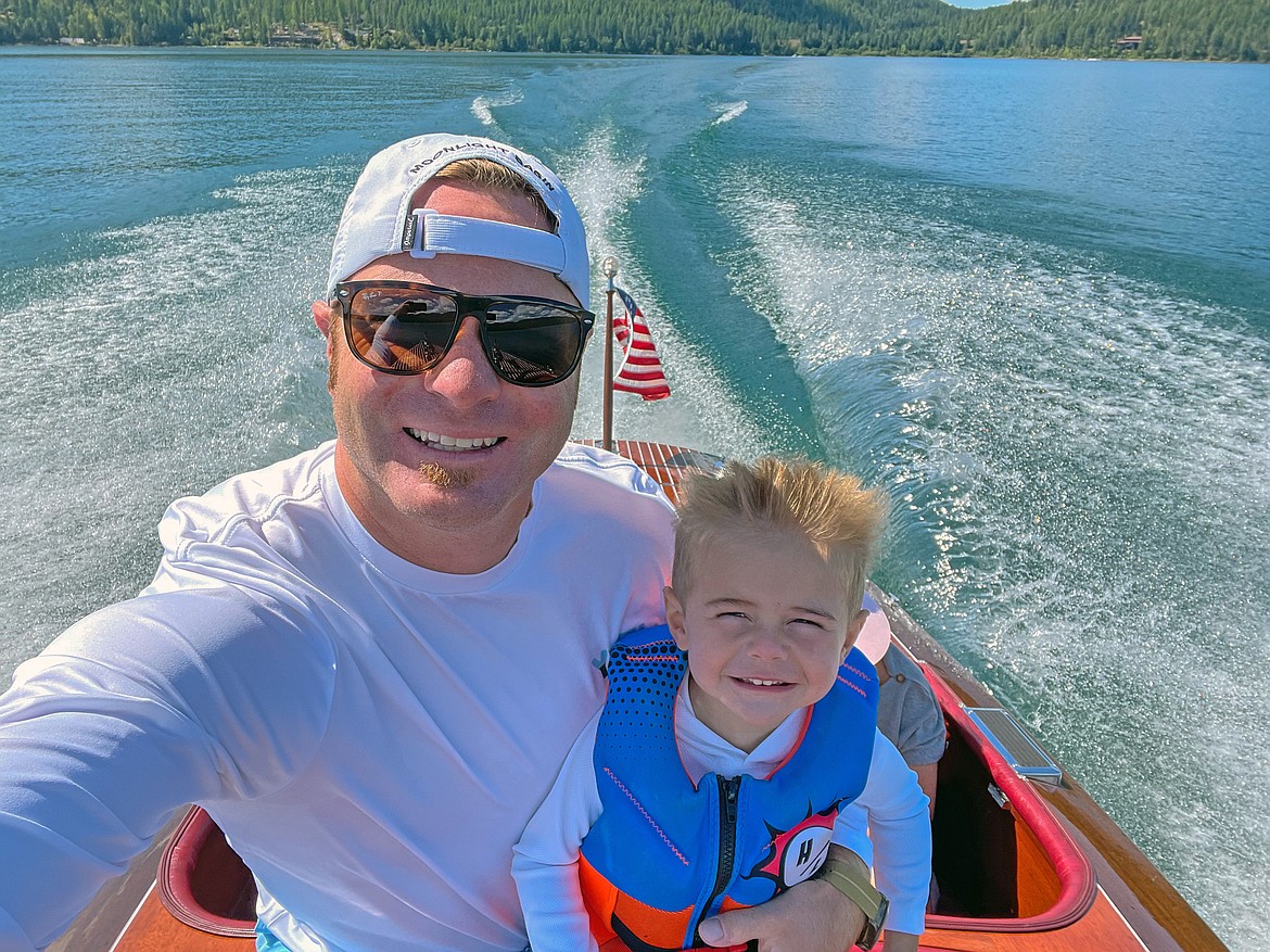 Derek Bronken with son Owen on Whitefish Lake. (Photo by Bronken)
