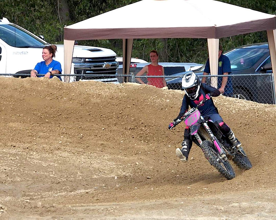 Libby's Rylin Uithof takes a sharp turn Saturday, June 22, 2024, during a race at the Millpond Motocross races in Libby. (Courtesy photo)