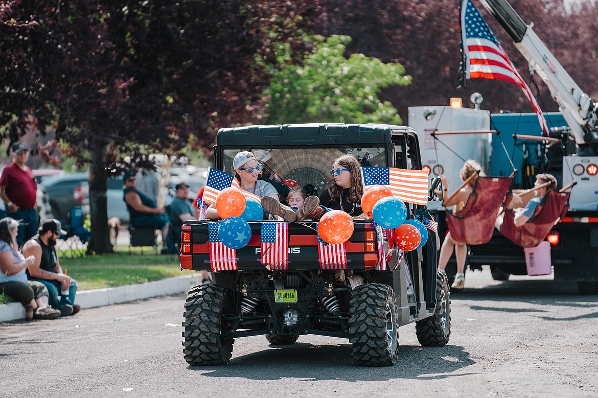 Rigs of all sizes roll down the parade route at the July 4 celebration in George in 2023.