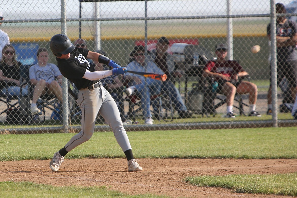 Almira/Coulee-Hartline Legion second baseman Hunter Flaa makes contact with a pitch for a single during the nightcap of Friday’s doubleheader against East Valley.