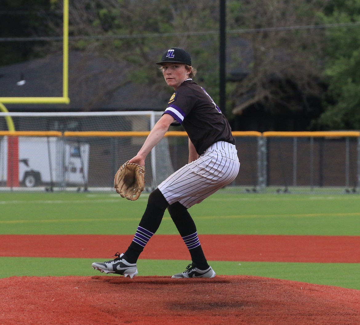 MAX OSWALD/Bonner County Daily Bee
Northern Lakes pitcher Jace Taylor goes into his windup during the first game of Wednesday's doubleheader with North Idaho at Memorial Field in Sandpoint.