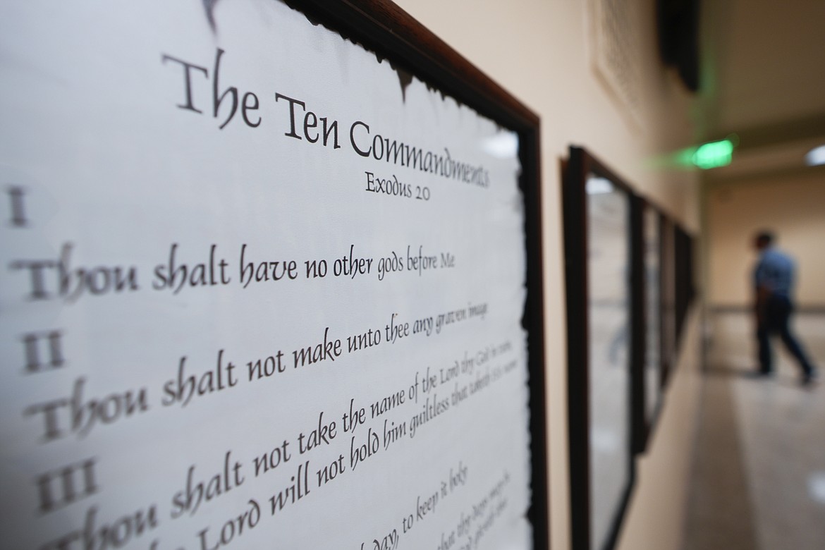 A copy of the Ten Commandments is posted along with other historical documents in a hallway of the Georgia Capitol, Thursday, June 20, 2024, in Atlanta. Civil liberties groups filed a lawsuit Monday, June 24, challenging Louisiana’s new law that requires the Ten Commandments to be displayed in every public school classroom. (AP Photo/John Bazemore, File)