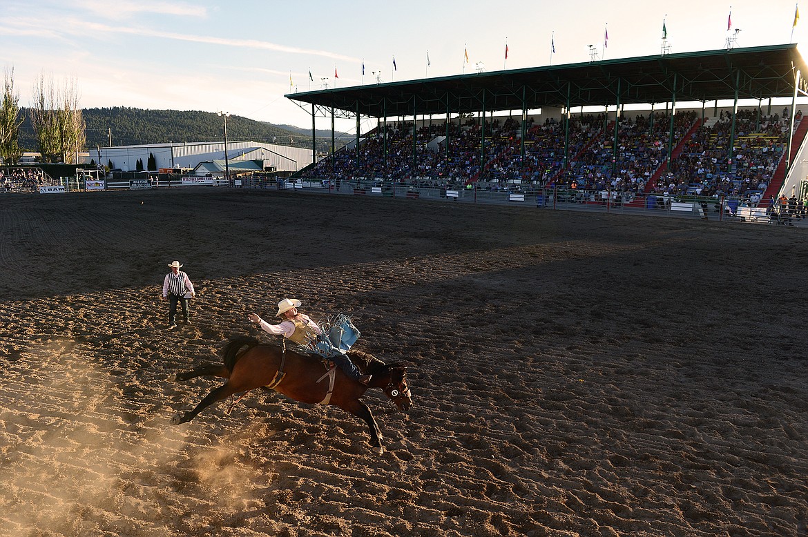 Tristan Hansen, from Dillon, rides Control Freak during bareback riding at the Northwest Montana Fair & Rodeo on Saturday, Aug. 22. (Casey Kreider/Daily Inter Lake)