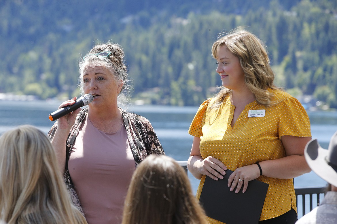 North Idaho Fair and Rodeo Foundation President Kim Weatherford, left, and Development Director Serena Caples address attendees of the foundation's scholarship awards luncheon Friday.