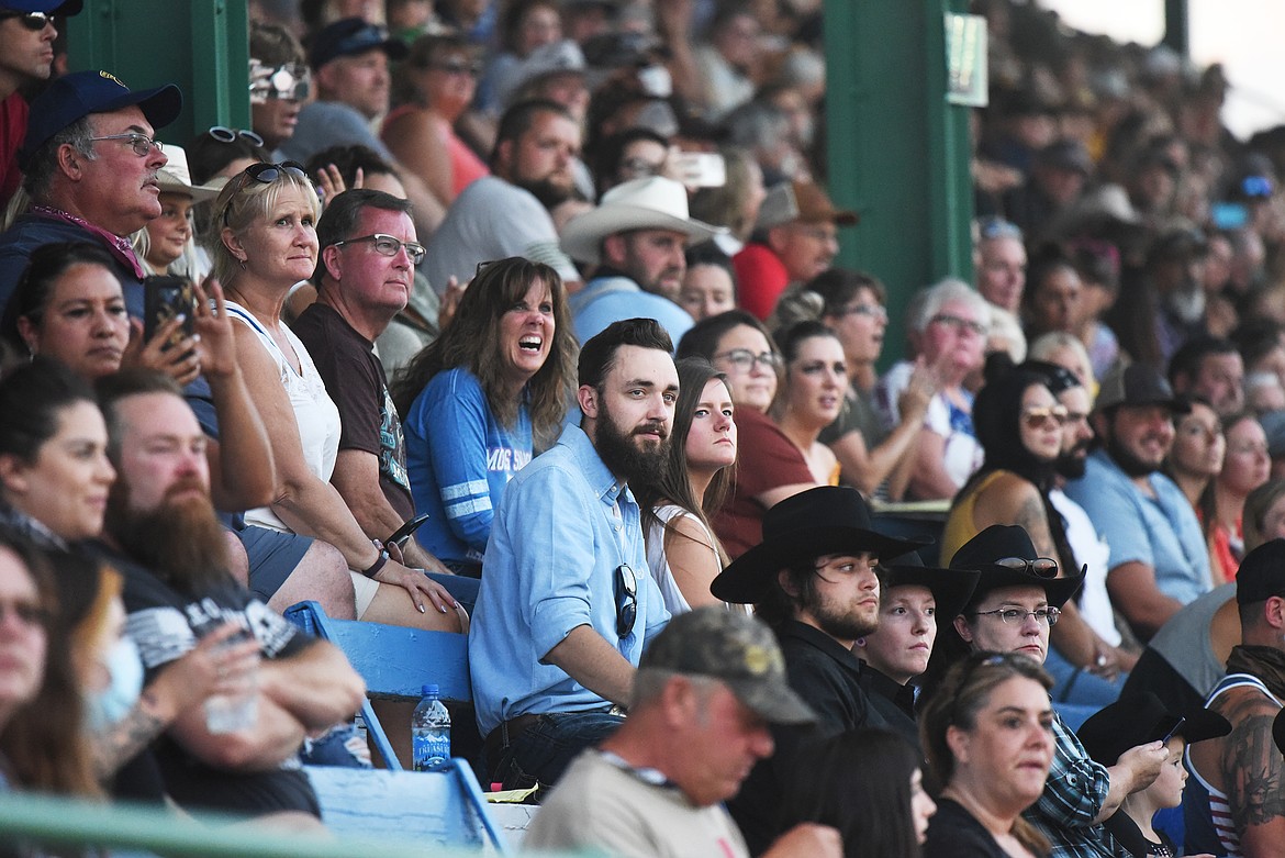 Fans watch the Indian Relay Races from the grandstands during the Northwest Montana Fair & Rodeo at the Flathead County Fairgrounds in Kalispell on Friday, Aug. 21. (Casey Kreider/Daily Inter Lake)