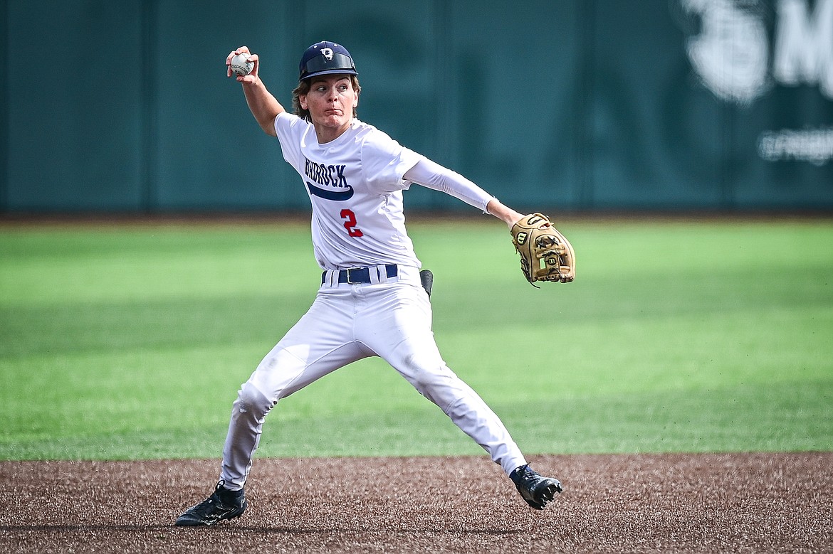 Badrock shortstop Drew Queen (2) throws to first base against the Kalispell Sluggers 15U/16U during the Badrock Invitational at Glacier Bank Park on Saturday, June 29. (Casey Kreider/Daily Inter Lake)