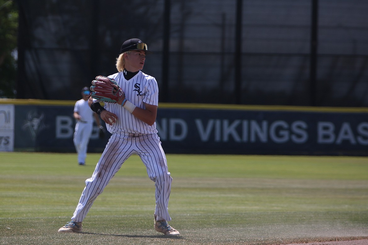 Central Washington Sixers shortstop Maddox Herrund looks toward first base after picking up a ground ball against RSP Baseball 16U on Friday morning.