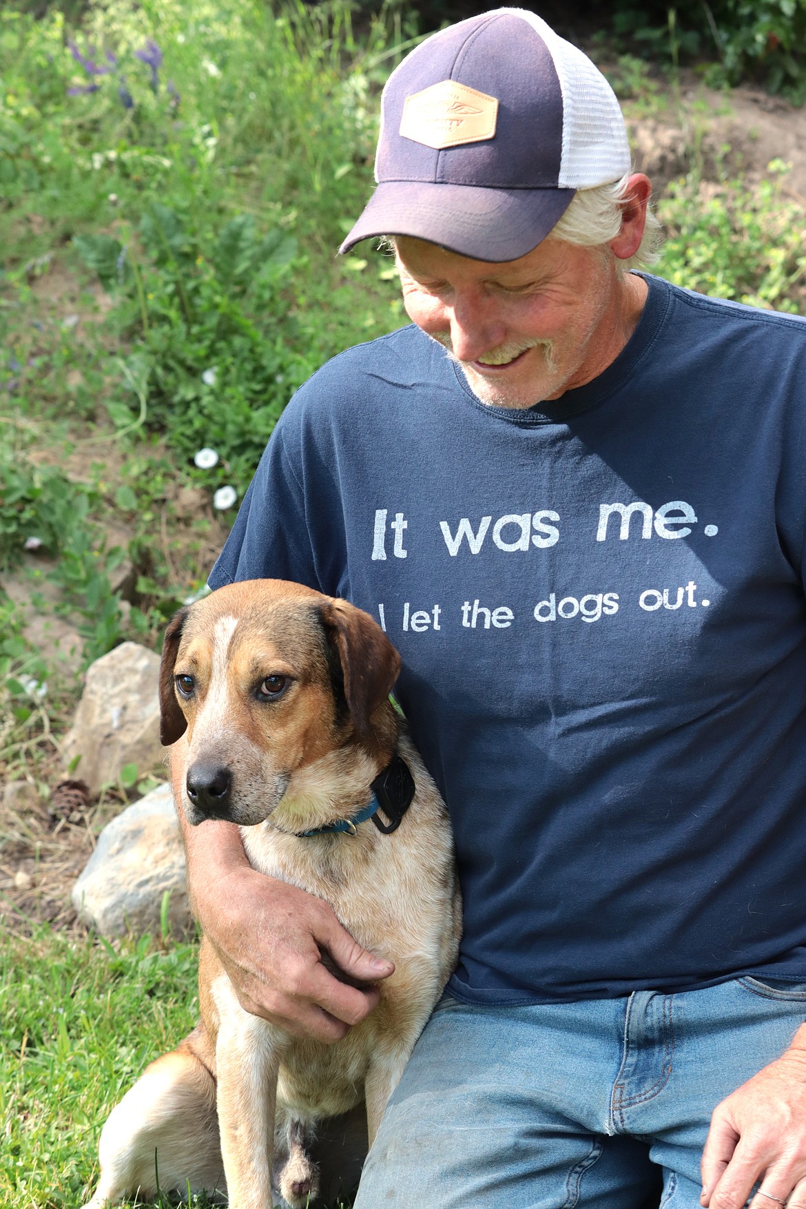 Jim Styner and Mr. Bay share a moment at the Styner's Fernan home on Friday.