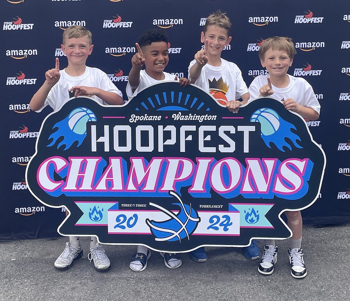 Courtesy photo
The PrimeTimers from Coeur d'Alene went 5-0 to win their third grade competitive bracket at Hoopfest last weekend in downtown Spokane. From left are Maxxon Morrison (who hit the game-winner to clinch the championship), Zion Williams, Trey Brown and Jimmy Hembree.