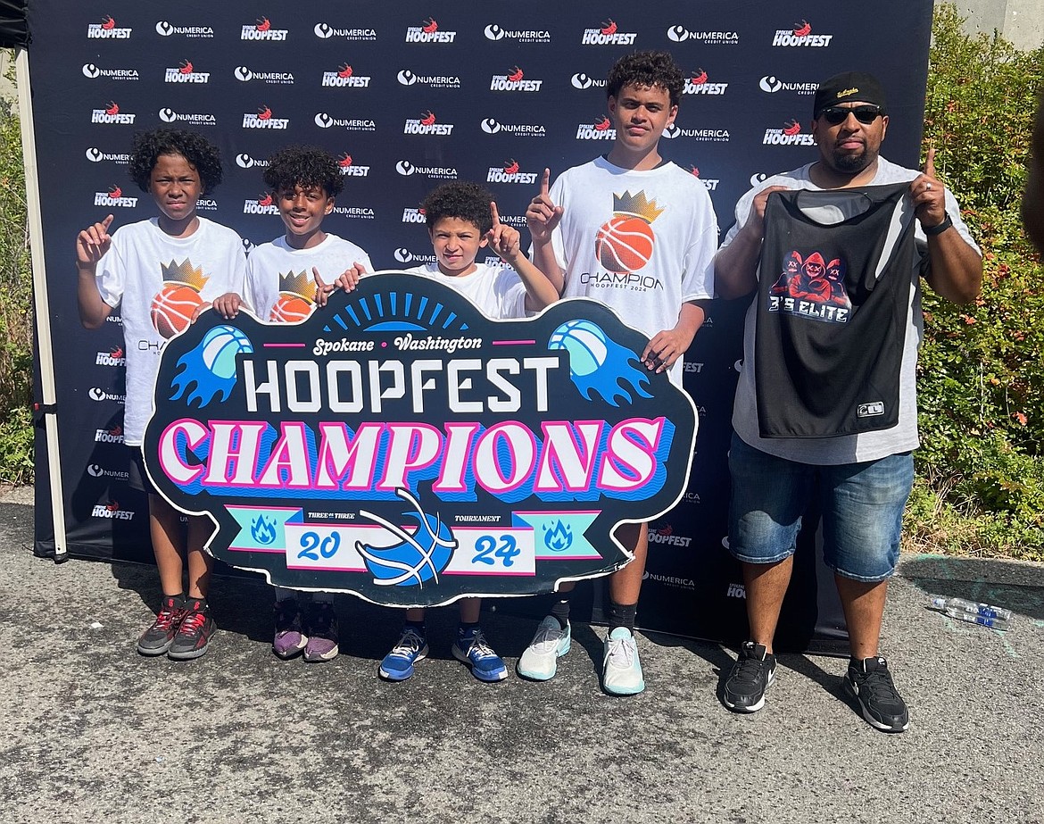 Courtesy photo
Three's Elite, all from the Post Falls area, went 5-0 and won its seventh grade boys bracket at Hoopfest in Spokane last weekend. From left are Kingston Carter, Aure Brennan, Jeremiah Cade, William Ferguson and coach AJ Cade. Three's Elite won the championship game 20-12. "Every team we played had us beat by size, but our fiesty defense and excellent shooting brought home the victory," the team noted.